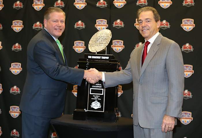 Jan 6, 2013; Fort Lauderdale FL, USA; Notre Dame head coach Brian Kelly (left) shakes hands with Alabama Crimson Tide head coach Nick Saban during a press conference for the 2013 BCS National Championship game at Harbor Beach Marriott Resort & Spa. Mandatory Credit: Matthew Emmons-USA TODAY Sports